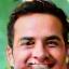 Headshot of a smiling male small business owner.