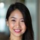 Portrait of Sarah Chen, satisfied business owner.